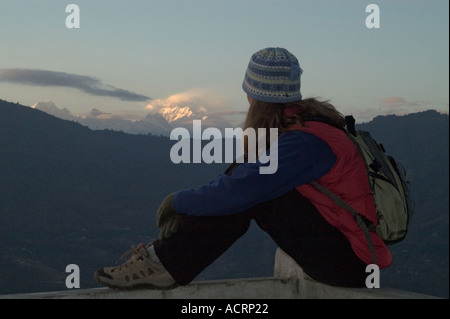 Wende Valentine gazes at the setting sun on Kanchenjunga from Gangtok Sikkim India Stock Photo
