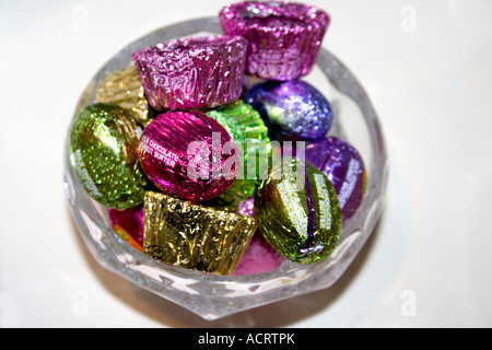 Bowl of foil wrapped chocolates.  Mahtomedi Minnesota USA Stock Photo
