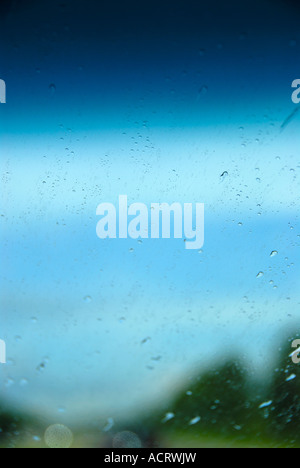Rain drops on a windshield selective focus Stock Photo