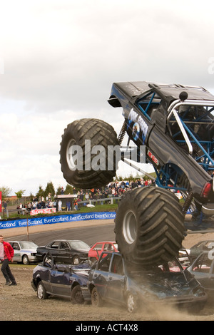 Grim Reaper monster truck airborne crushing car at Knockhill Motorfair 2006 Stock Photo