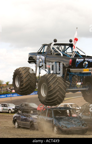 Grim Reaper monster truck airborne crushing car at Knockhill Motorfair 2006 Stock Photo