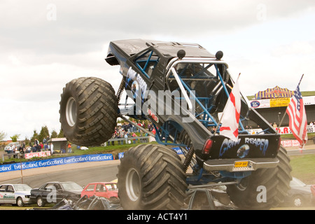 Grim Reaper monster truck airborne crushing car at Knockhill Motorfair 2006 Stock Photo