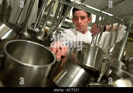 A CHEF WITH POTS AND PANS Stock Photo