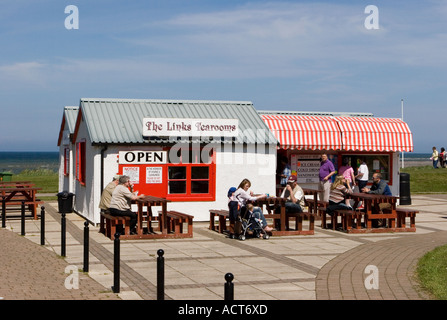 People at Seaside Beach-front village Cafe; The Links coastal Tearooms, Family British Tea Room Scotland, UK Stock Photo