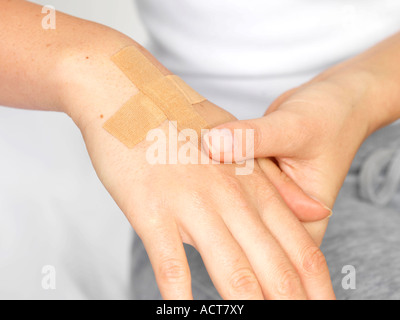 Young Woman Applying Plaster Model Released Stock Photo