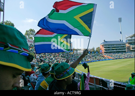 Spectators waving the South African Flag at the Wanderers Cricket stadium Johannesburg Gauteng South Africa Stock Photo
