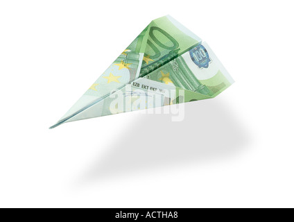 paperflier made from a euro bill Papierflugzeug aus Euroschein Stock Photo