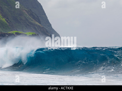Rough wave breaking on Kalaupapa leper colony beach on Molokai Hawaii Stock Photo
