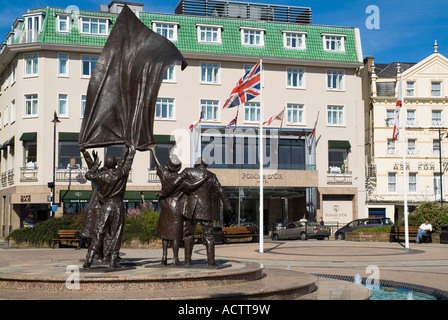 dh Liberation Square ST HELIER JERSEY Liberation statue and Pomme dOr Hotel ex German Headquarters monument Stock Photo
