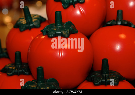 Tomato shaped ketchup dispensers Stock Photo