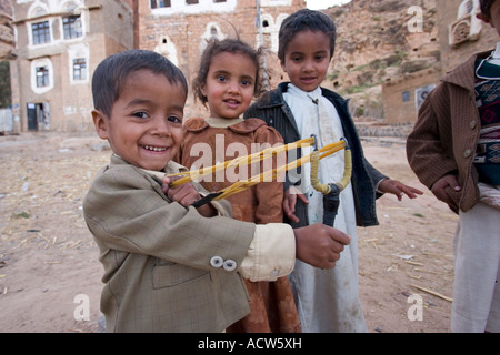 Children playing on the street in the Village of Shibam near Sanaa Yemen Stock Photo