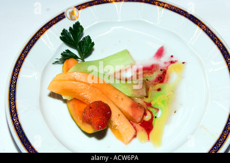 Fresh fruit plate appetizer at the Rotterdam Restaurant on the Holland America cruise ship Zaandam Stock Photo