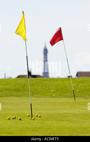 Golf course flags with Blackpool Tower in the background Stock Photo