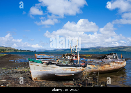 Isle of Mull ruined fishing boats on the eastern shoreline Scottish Isles Scotland UK United Kingdom GB Great Britain Europe EU Stock Photo