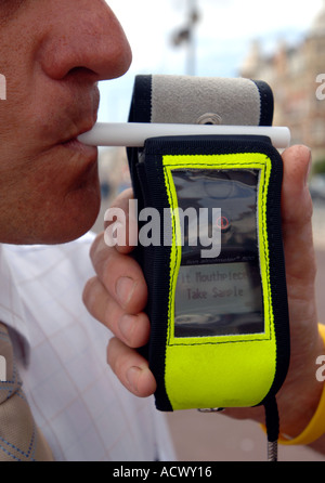 Close up of a police breathalyser being used on a man Stock Photo