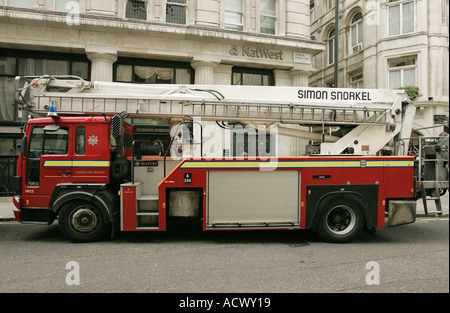 Fire track keeper street emergency alarm red speed danger destructive brave save life Soho Central London fire brigade water lad Stock Photo