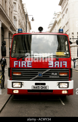 Fire track keeper street emergency alarm red speed danger destructive brave save life Soho Central London fire brigade water lad Stock Photo