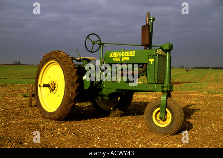 A vintage John Deere tractor at a ploughing competition Stock Photo