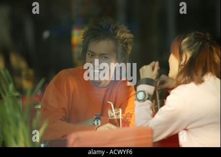 Chinese young couple in a bar Stock Photo