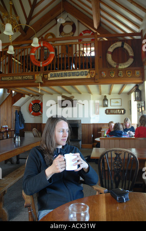 tourist in the marisco tavern on Lundy Island Stock Photo