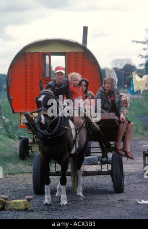 Gypsy family traditional wooden bow topped caravan Southern Ireland Eire Grandmother mother four children  1970s 70s  HOMER SYKES Stock Photo