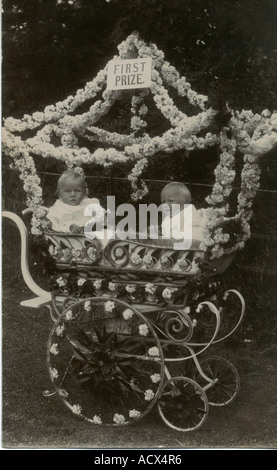 Photographic postcard of decorated pram in baby show circa 1895 Stock Photo