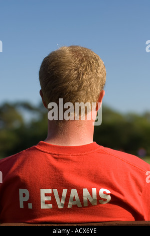 P Evans , blonde haired young man in red shirt and sunburned neck Stock Photo