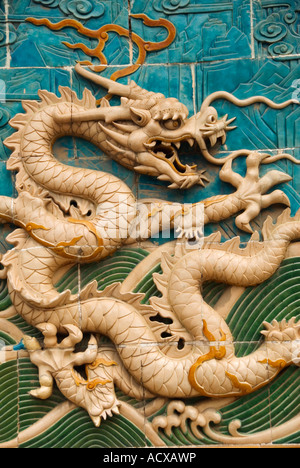 Detail of ornate ceramic dragon on Nine Dragons Screen wall at Beihai Park Beijing Stock Photo