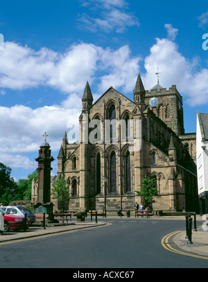 Market Cross and East facade of Hexham Abbey seen over the Market Place, Hexham, Northumberland, England, UK. Stock Photo