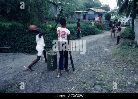 Grenada Children playing cricket Stock Photo
