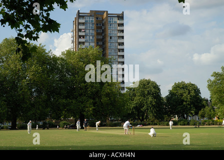 England London Hackney London Fields Cricket game in progress Stock Photo