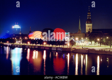View across the Daugava river to the Old Town at night, Riga, Latvia Stock Photo