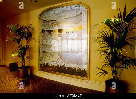 Close up view of a decorated mirror showing an interior view of a theatre in the hall way of The Old Vic Theatre London Stock Photo