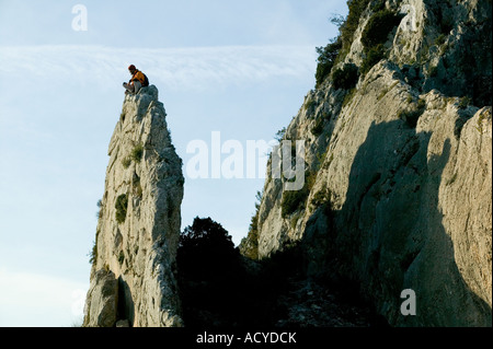 Climber on rock spire Bernia Ridge Costa Blanca Spain Stock Photo - Alamy