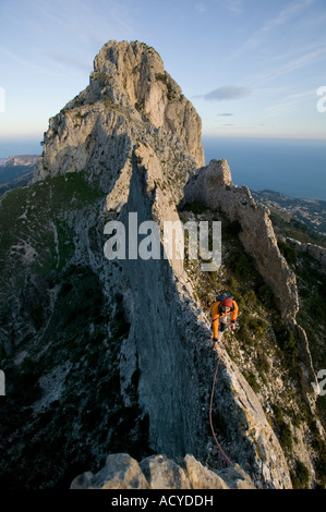Climber on narrow section of Bernia Ridge Costa Blanca Spain Stock Photo