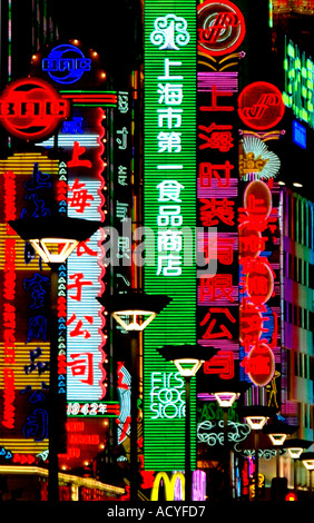 Neon lights above large store on Shanghai's Nanjing Donglu Road in China. Stock Photo