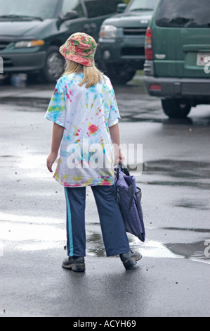 Loading kids items at camp parking lot for summer time vacation of camping even with the rain of Georgia USA America Stock Photo