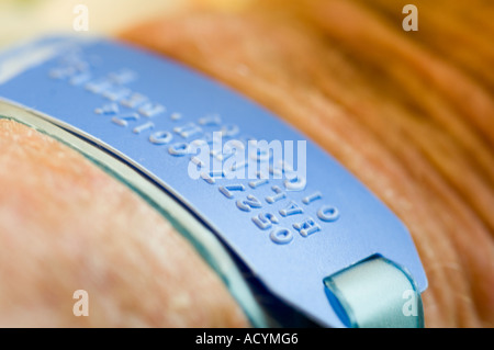 closeup view of identification bracelet worn by hospital patient Stock Photo