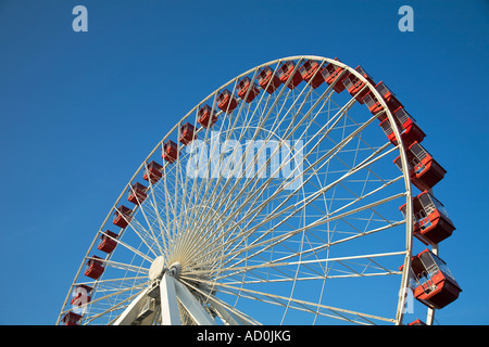 CHICAGO Illinois Large white ferris wheel with red gondola cars against blue sky portion of wheel Navy Pier Stock Photo
