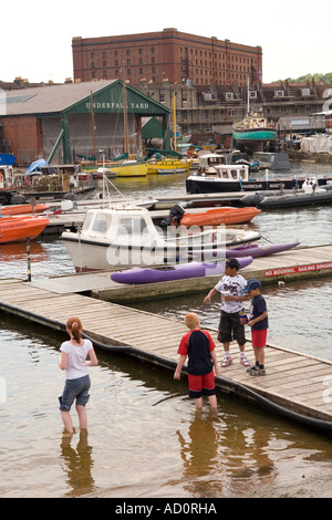 England Bristol Baltic Wharf children playing on slipway Stock Photo