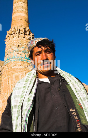 Afghanistan, Ghor Province, Afghani man infront of 12th Century Minaret of Jam Stock Photo