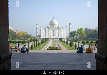 Horizontal wide angle of the Taj Mahal mosque through the doorway of the South Gateway on a bright sunny day Stock Photo