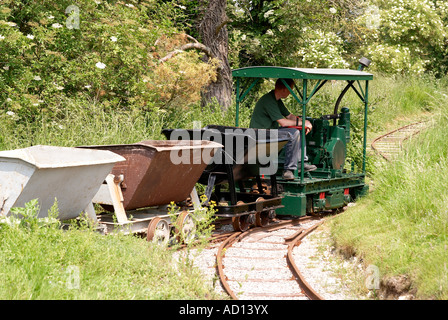 Industrial narrow gauge railway demonstration track at Twyford Waterworks, Winchester, Hampshire - train of tipper wagons Stock Photo