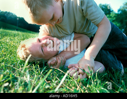 fight fighting boys Stock Photo - Alamy