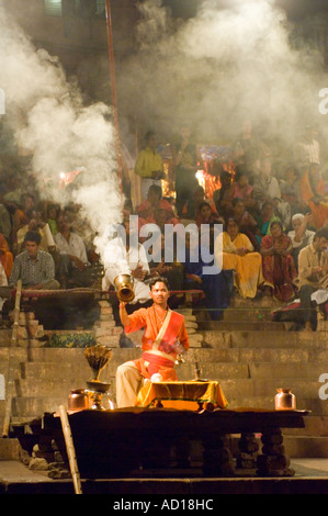 A view of aarti (prayers) being performed by young priests (pujaris) at the Dasaswamedh Ghat in Varanasi. Stock Photo