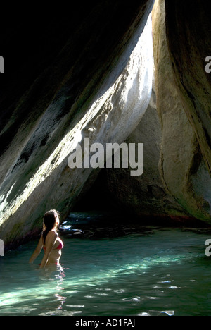 virgin gorda bvi baths islands british grotto cavern cave sun beach paradise landscape beams bikini woman alamy