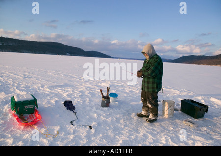 Putting away the gear after a day of ice fishing on Lake Otsego in Cooperstown New York Stock Photo
