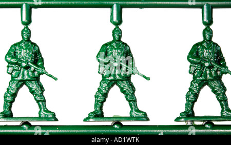 Green injection molded plastic toy model soldiers Stock Photo