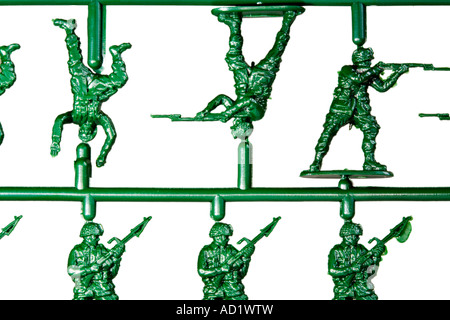 Green injection molded plastic toy model soldiers Stock Photo