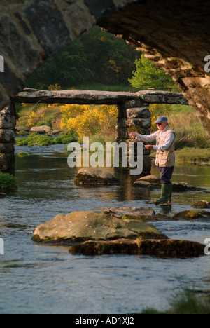 Fly fisherman on the river Dart Postbridge Dartmoor Devon UK Stock Photo